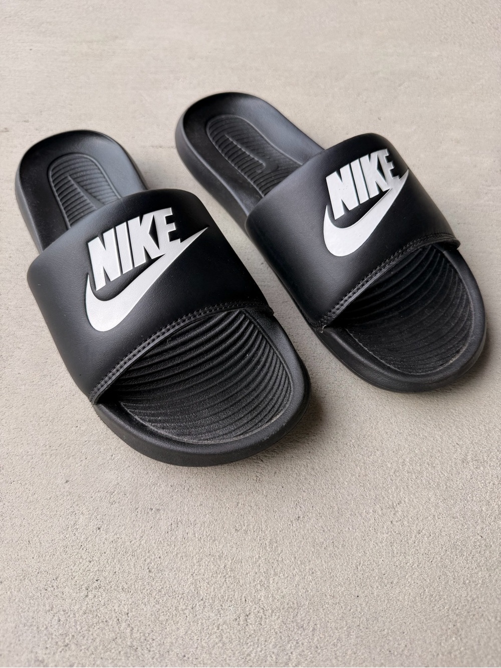 Nike Black Slides with White Swoosh